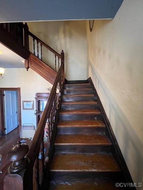 staircase with baseboards