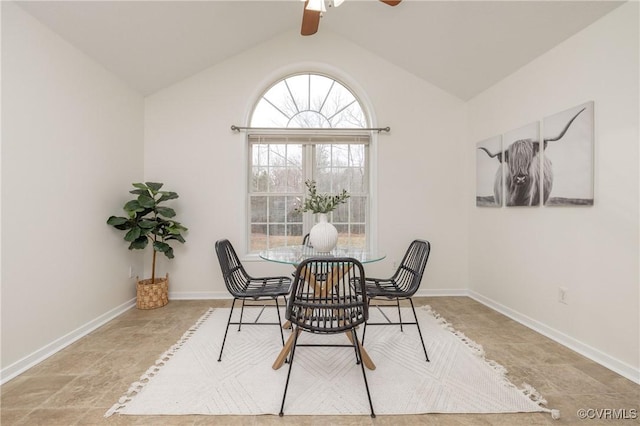 dining room with lofted ceiling with beams and ceiling fan