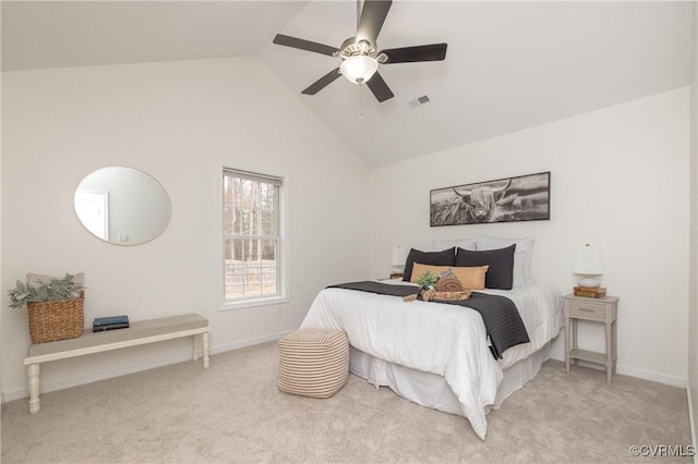 bedroom featuring light carpet, high vaulted ceiling, and ceiling fan