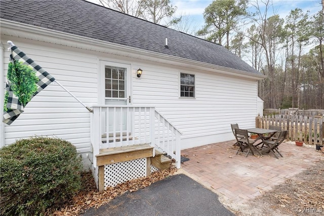 rear view of property featuring a patio