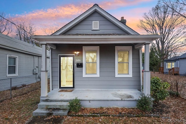 bungalow-style house featuring covered porch