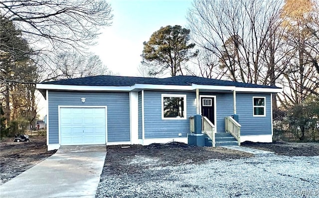 single story home featuring a garage