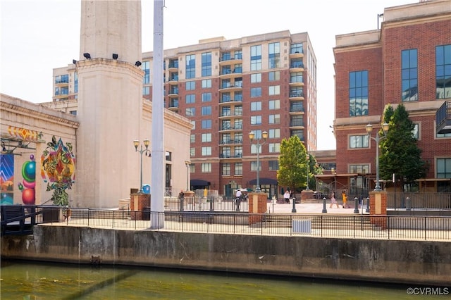 view of building exterior featuring a water view