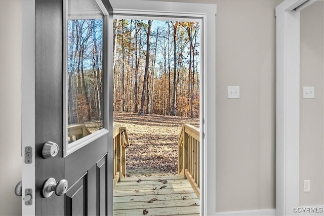 doorway to outside with hardwood / wood-style floors