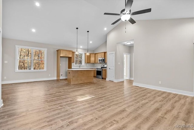 unfurnished living room featuring ceiling fan, high vaulted ceiling, and light hardwood / wood-style floors