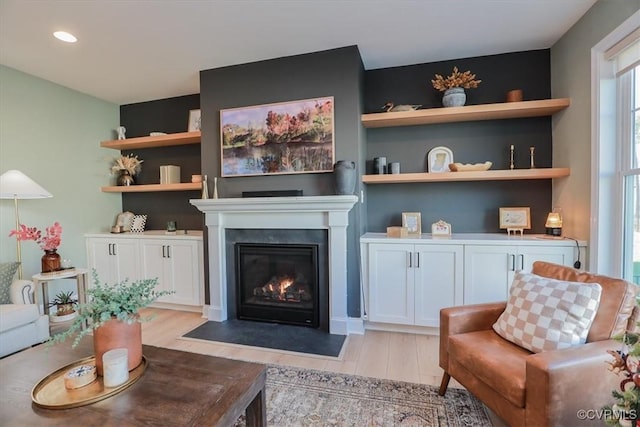 living room with light hardwood / wood-style floors