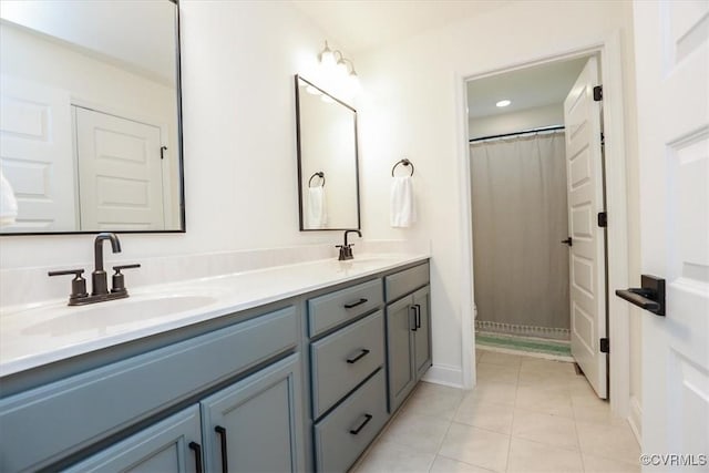 bathroom featuring vanity and tile patterned flooring