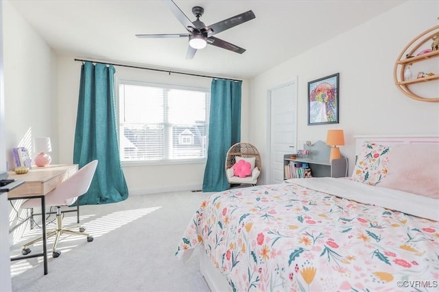 bedroom with ceiling fan and carpet flooring