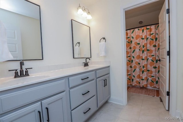 bathroom with vanity, tile patterned floors, and walk in shower