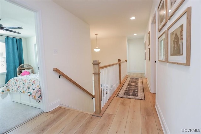 corridor featuring light hardwood / wood-style flooring