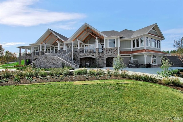 view of front of house featuring a porch and a front yard