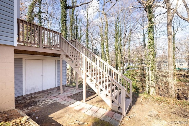 property entrance with a wooden deck