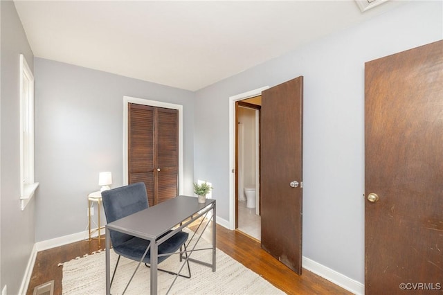 office space featuring hardwood / wood-style floors