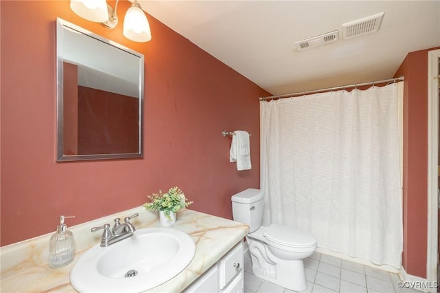 bathroom with tile patterned flooring, vanity, curtained shower, and toilet