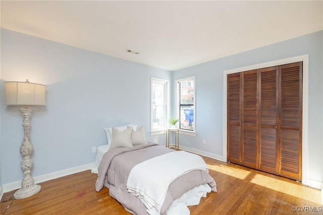 bedroom with light hardwood / wood-style flooring