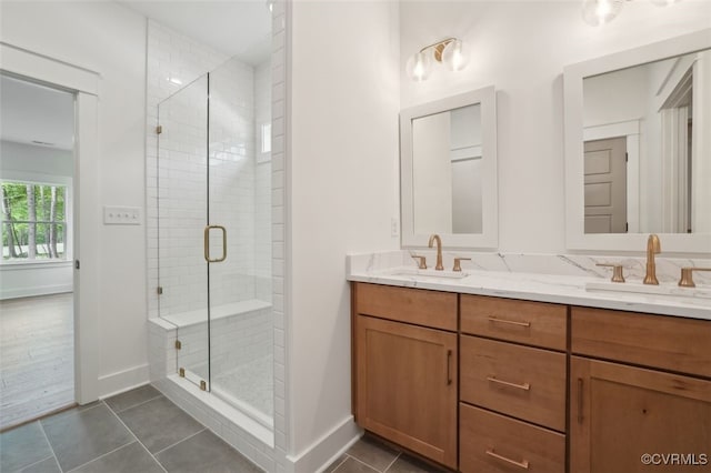 2219 Silver St, Aylett, VA 23009 - bathroom with double vanity, a stall shower, and tile patterned flooring