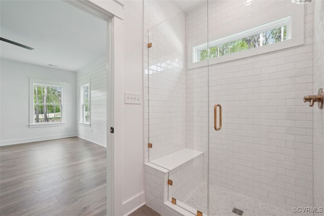 2219 Silver St, Aylett, VA 23009 - bathroom with a shower stall, wood finished floors, and ceiling fan