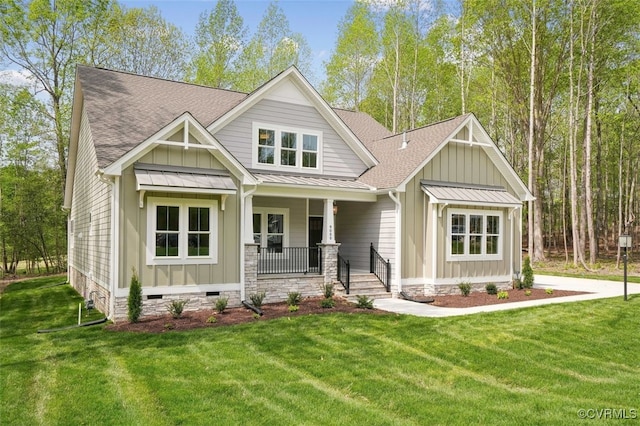 2219 Silver St, Aylett, VA 23009 - craftsman-style house featuring board and batten siding, a porch, a standing seam roof, roof with shingles, and a front yard