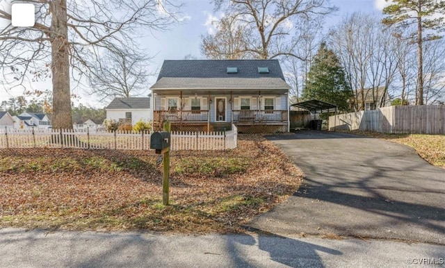 bungalow with covered porch and a carport