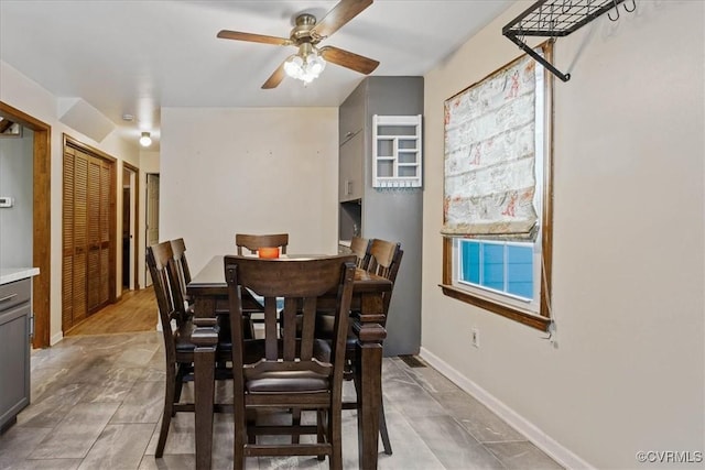 dining room with ceiling fan