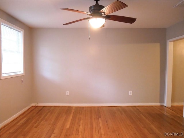 unfurnished room with light hardwood / wood-style floors and ceiling fan