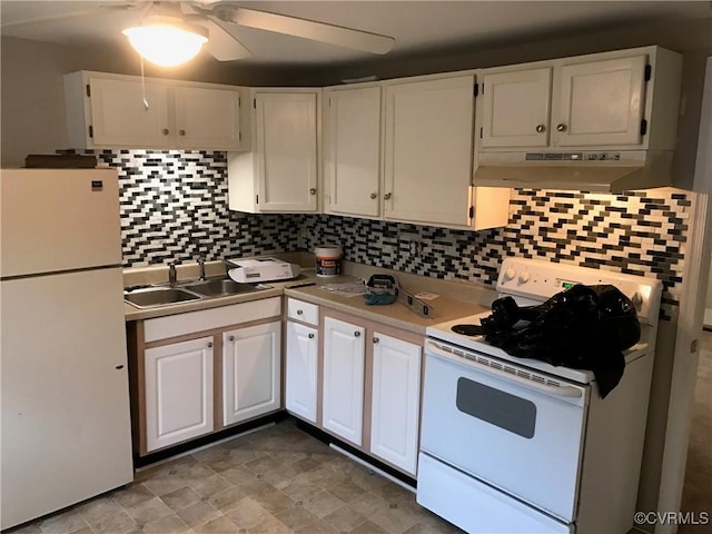 kitchen featuring white cabinets, white appliances, and sink