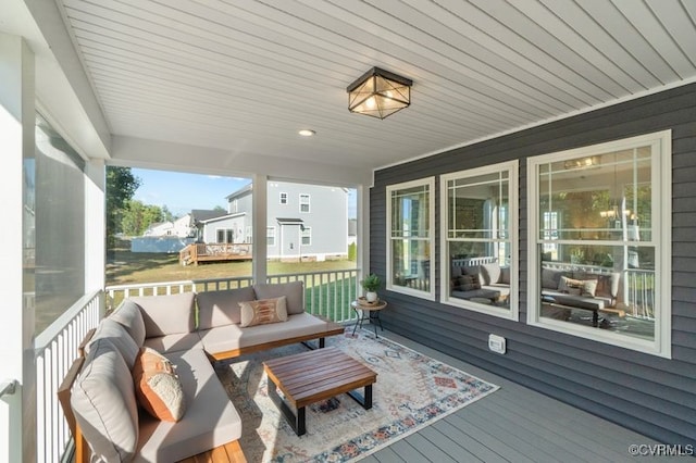 wooden deck featuring covered porch