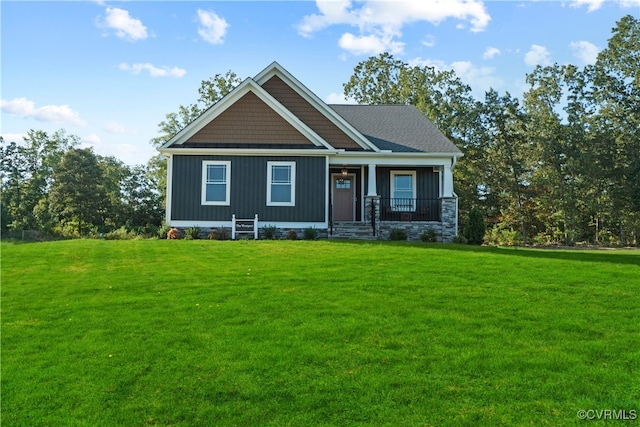 craftsman house with a porch and a front lawn