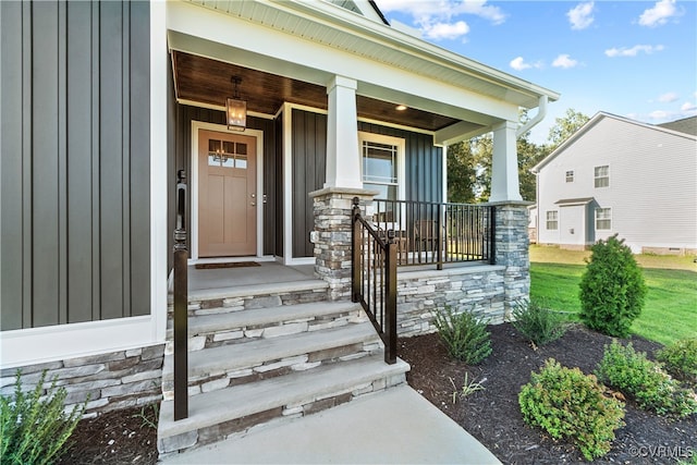 doorway to property with covered porch