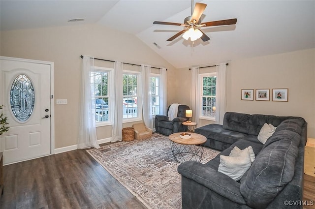 living room featuring vaulted ceiling, ceiling fan, and dark hardwood / wood-style floors