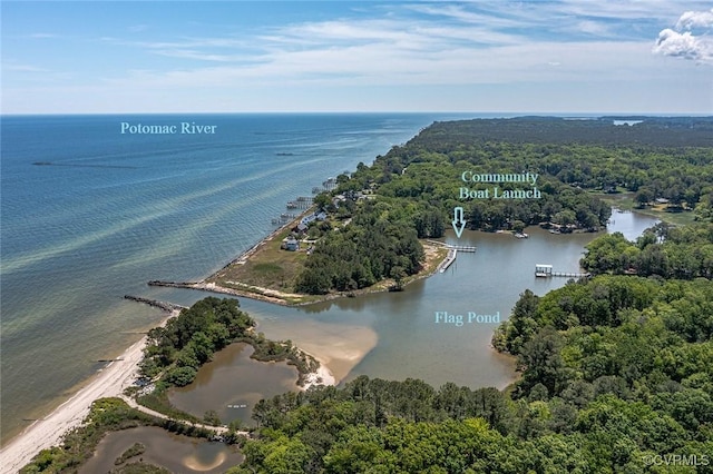 birds eye view of property featuring a water view