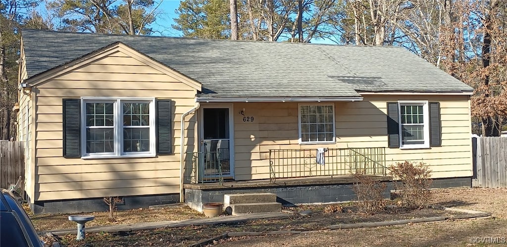 629 Hoke Dr, Petersburg, VA 23805 - view of front of property with a shingled roof and fence