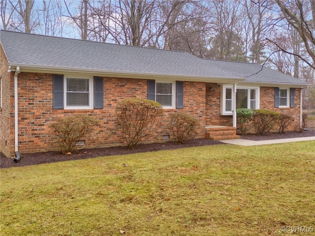 ranch-style house featuring a front lawn