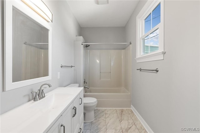 full bathroom with vanity, tub / shower combination, and toilet