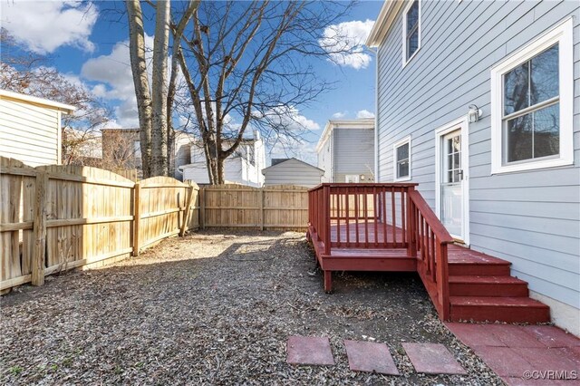 view of yard with a wooden deck