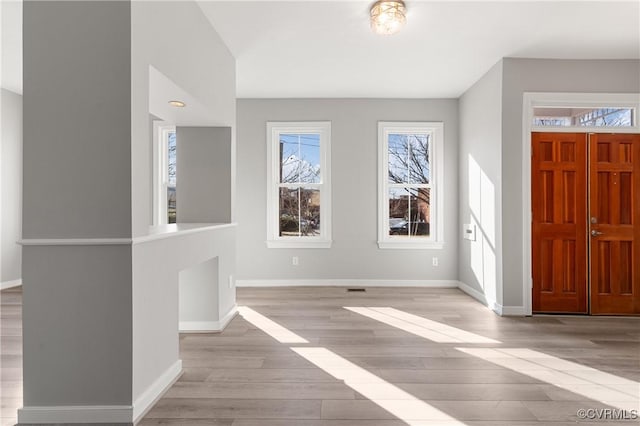 entryway with light wood-type flooring