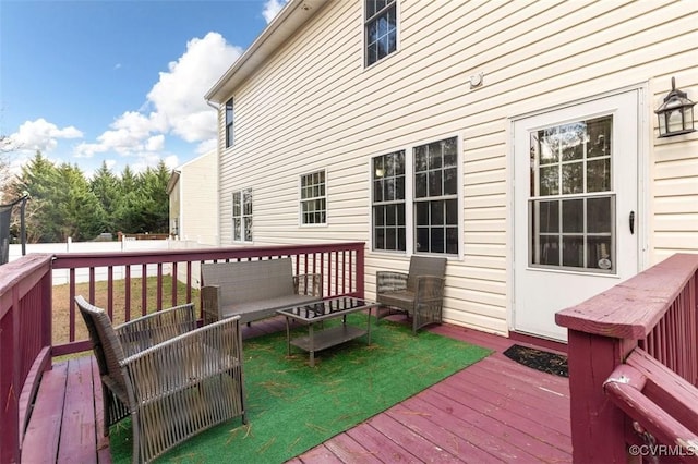 deck with an outdoor living space