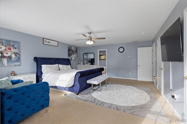 bedroom with carpet flooring, ceiling fan, and baseboards