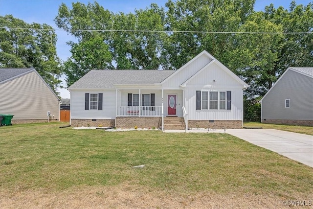 view of front of home featuring driveway, a porch, crawl space, and a front lawn