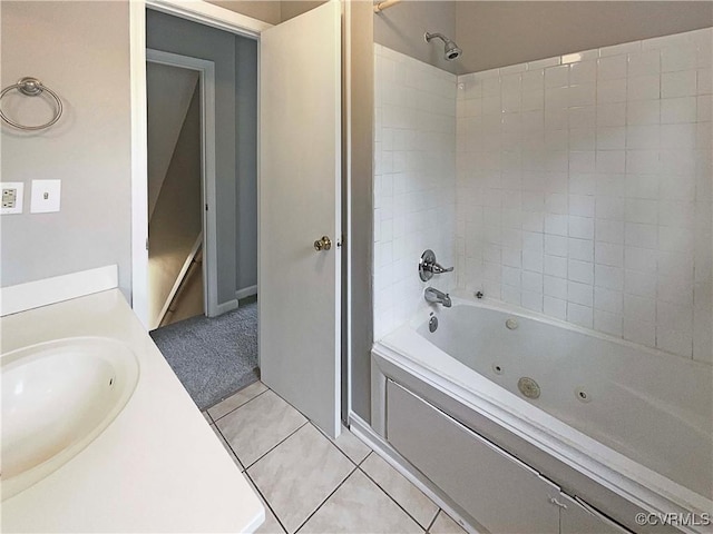 bathroom featuring tile patterned flooring, vanity, and shower / washtub combination