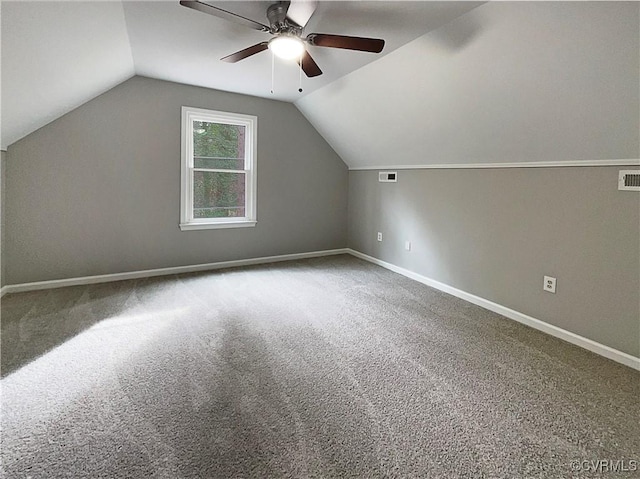 additional living space featuring carpet flooring, ceiling fan, and lofted ceiling