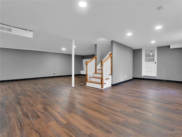 basement featuring dark wood-type flooring