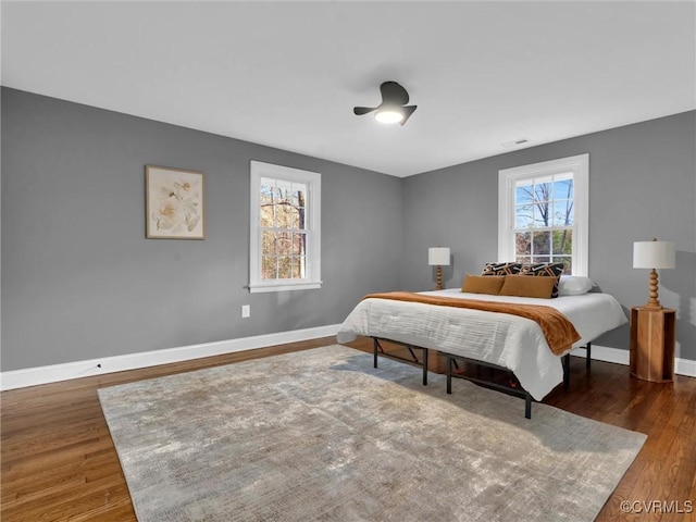 bedroom featuring dark wood-type flooring