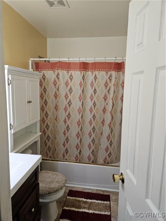 full bathroom with vanity, toilet, and shower / bath combo with shower curtain