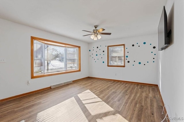 unfurnished room featuring light wood-type flooring and ceiling fan