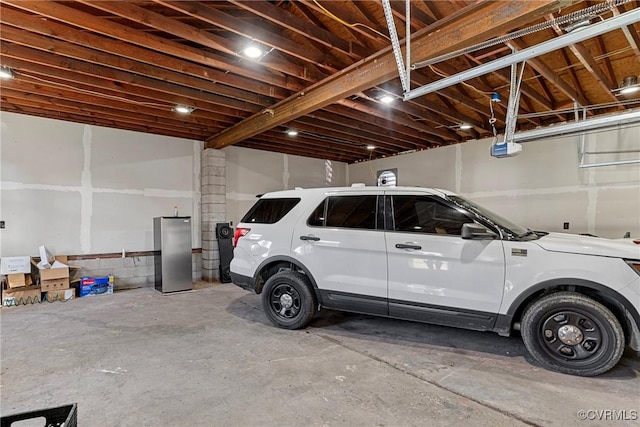 garage featuring a garage door opener