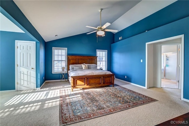 bedroom featuring ceiling fan, light carpet, and vaulted ceiling