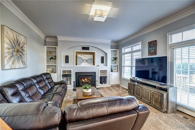 carpeted living room featuring ornamental molding