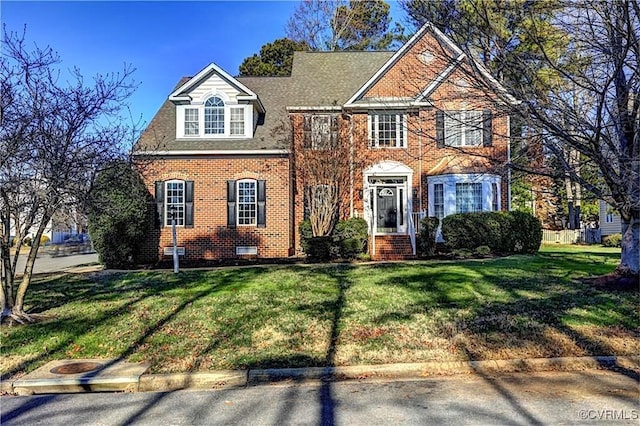 view of front of property featuring a front yard