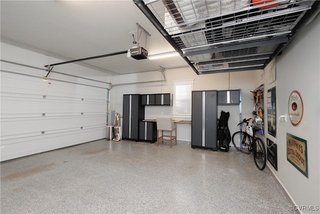 garage featuring a garage door opener